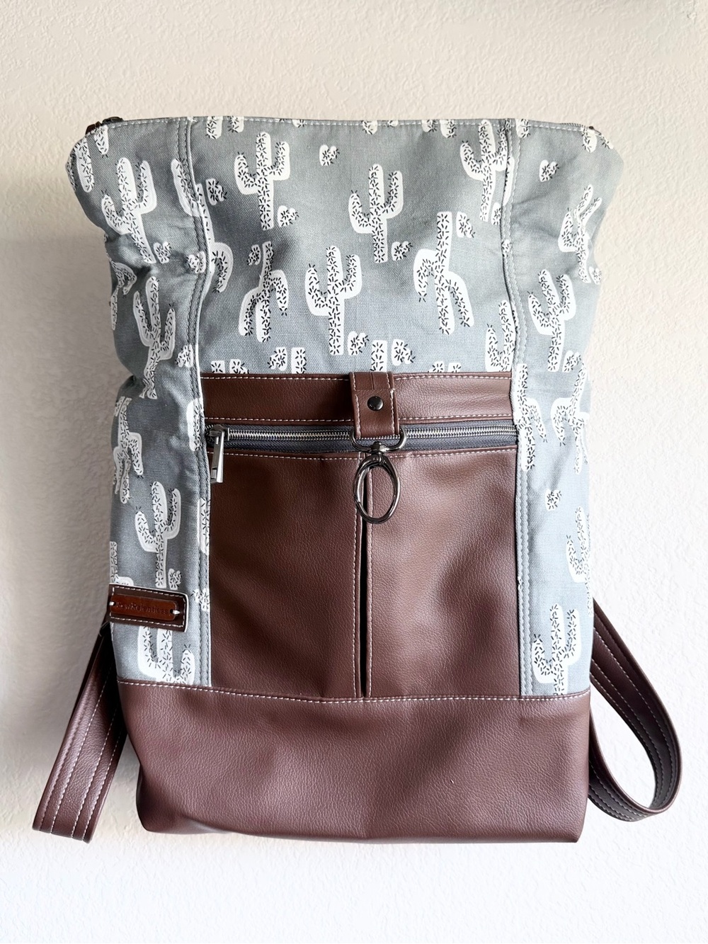 Leather cactus foldover backpack